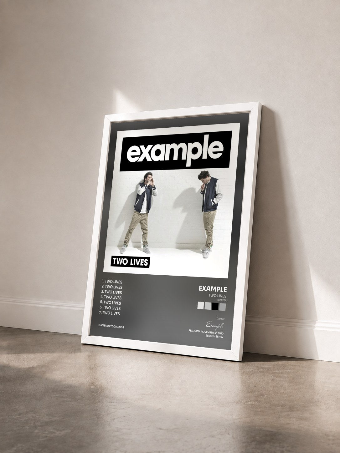 #blanc Tableau de l'album Two Lives (Remixes) de Example vu de trois quarts, cadre blanc