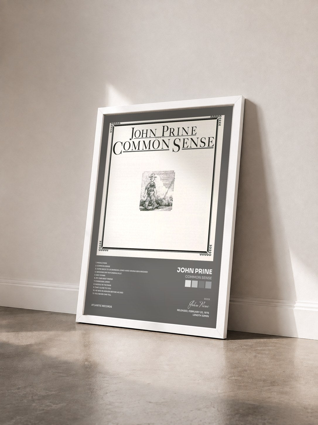 #blanc Tableau de l'album Common Sense de John Prine vu de trois quarts, cadre blanc