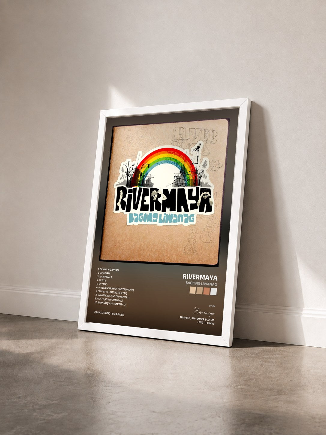 #blanc Tableau de l'album Bagong Liwanag de Rivermaya vu de trois quarts, cadre blanc
