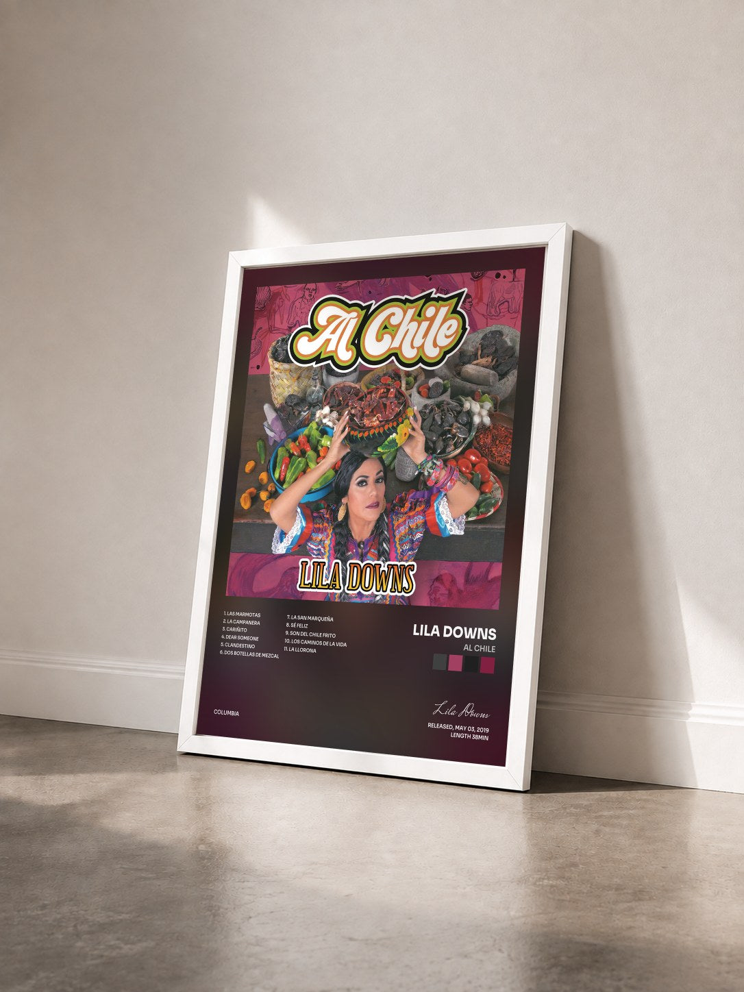 #blanc Tableau de l'album Al Chile de Lila Downs vu de trois quarts, cadre blanc