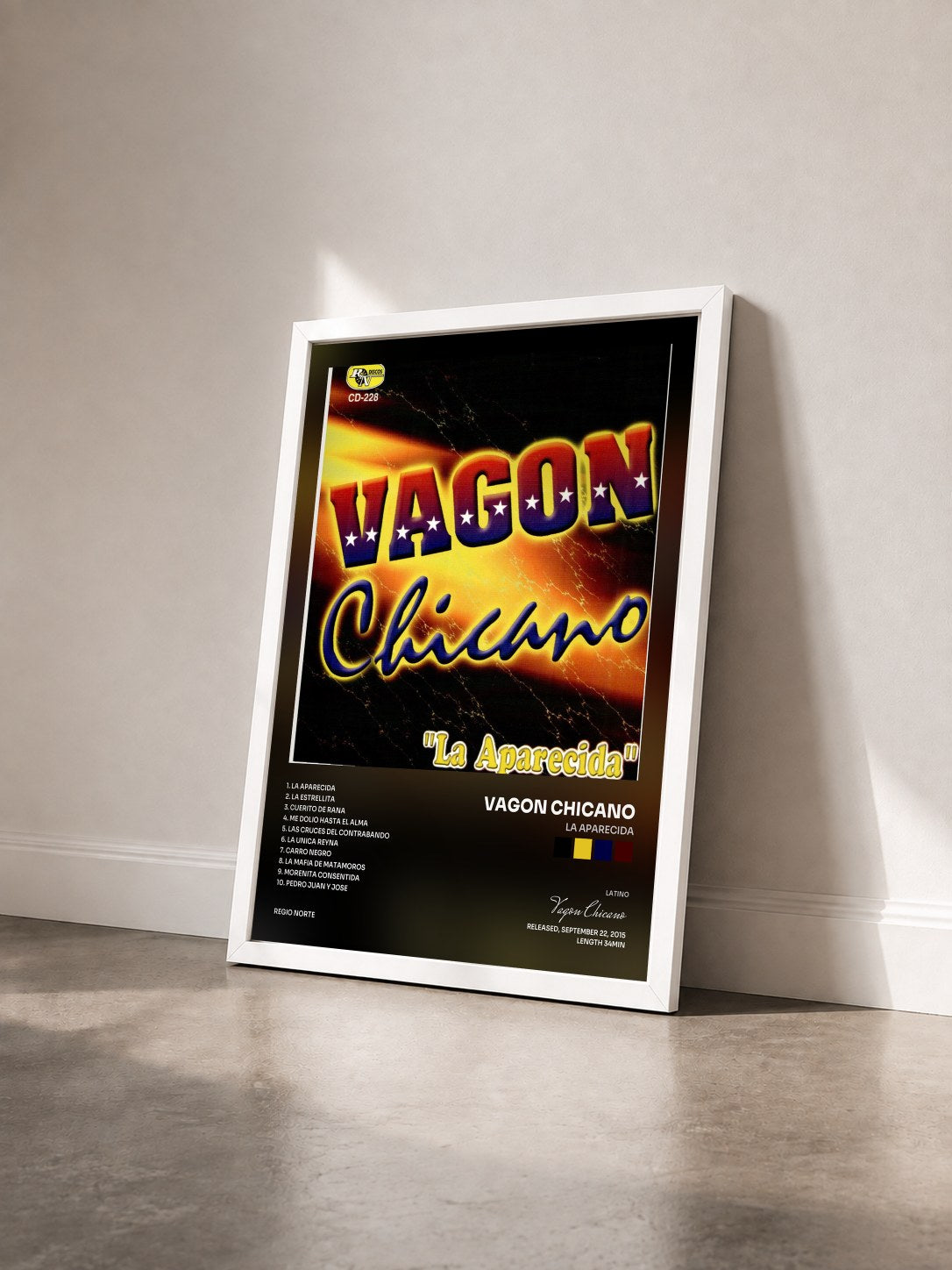 #blanc Tableau de l'album La Aparecida de Vagon Chicano vu de trois quarts, cadre blanc