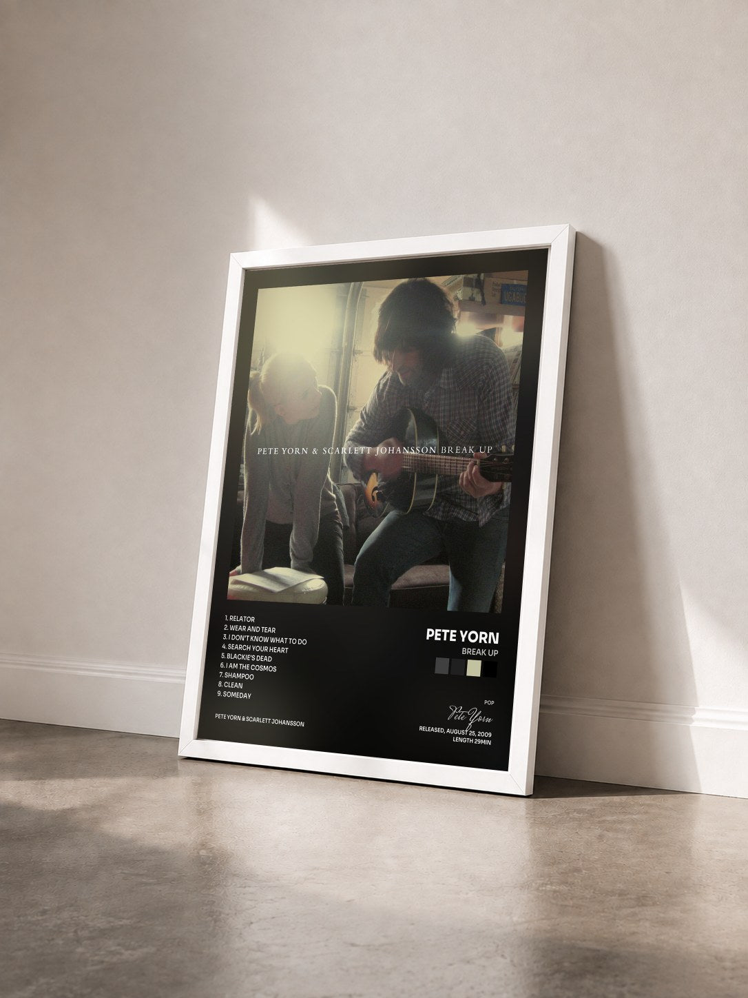 #blanc Tableau de l'album Break Up de Pete Yorn vu de trois quarts, cadre blanc