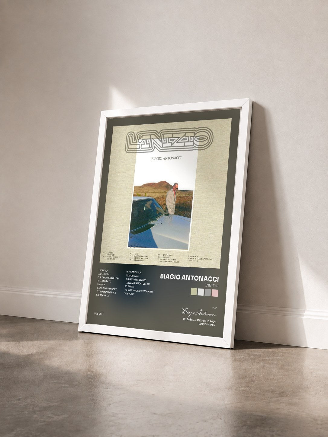 #blanc Tableau de l'album L'inizio de Biagio Antonacci vu de trois quarts, cadre blanc