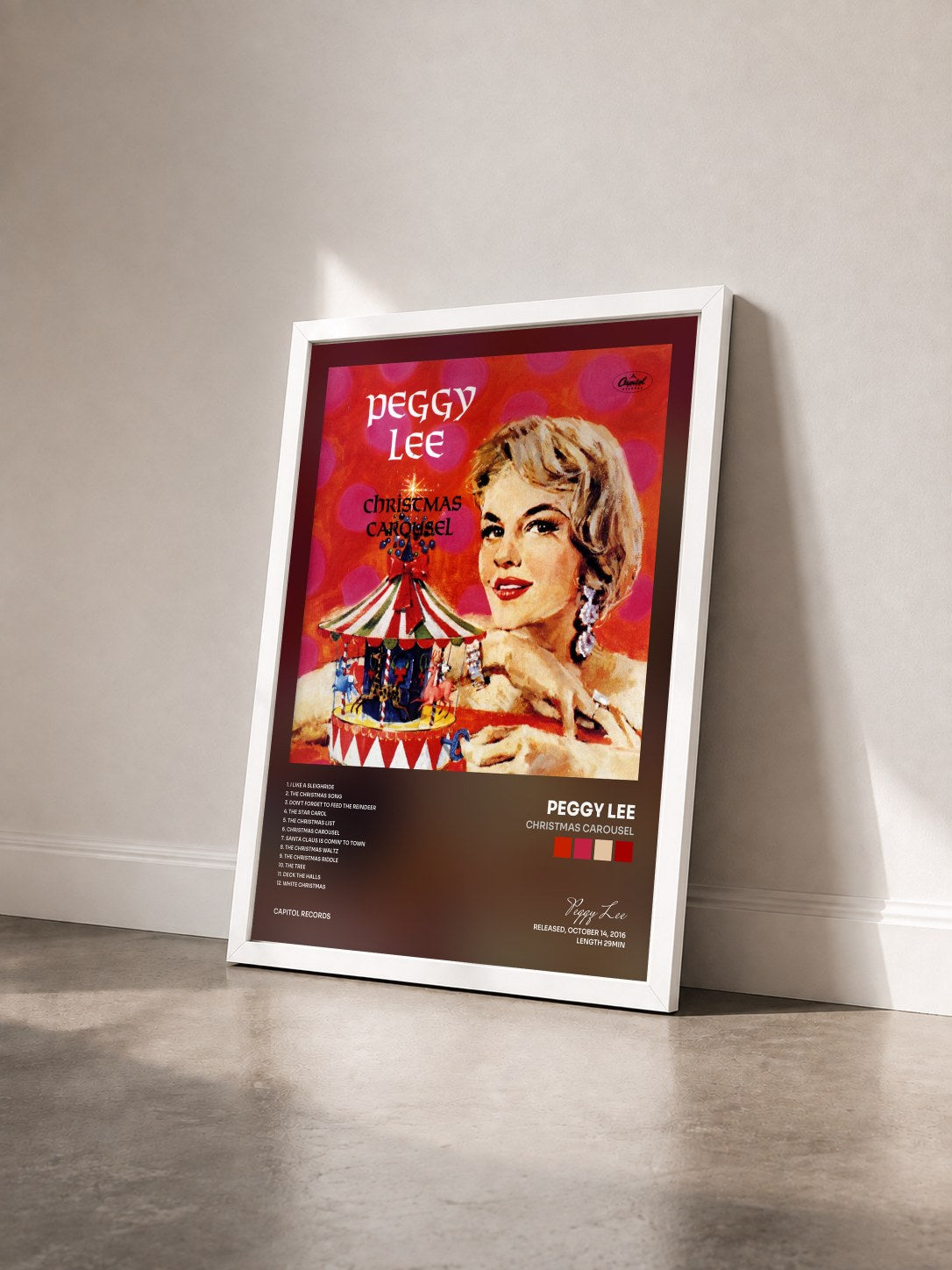 #blanc Tableau de l'album Christmas Carousel de Peggy Lee vu de trois quarts, cadre blanc