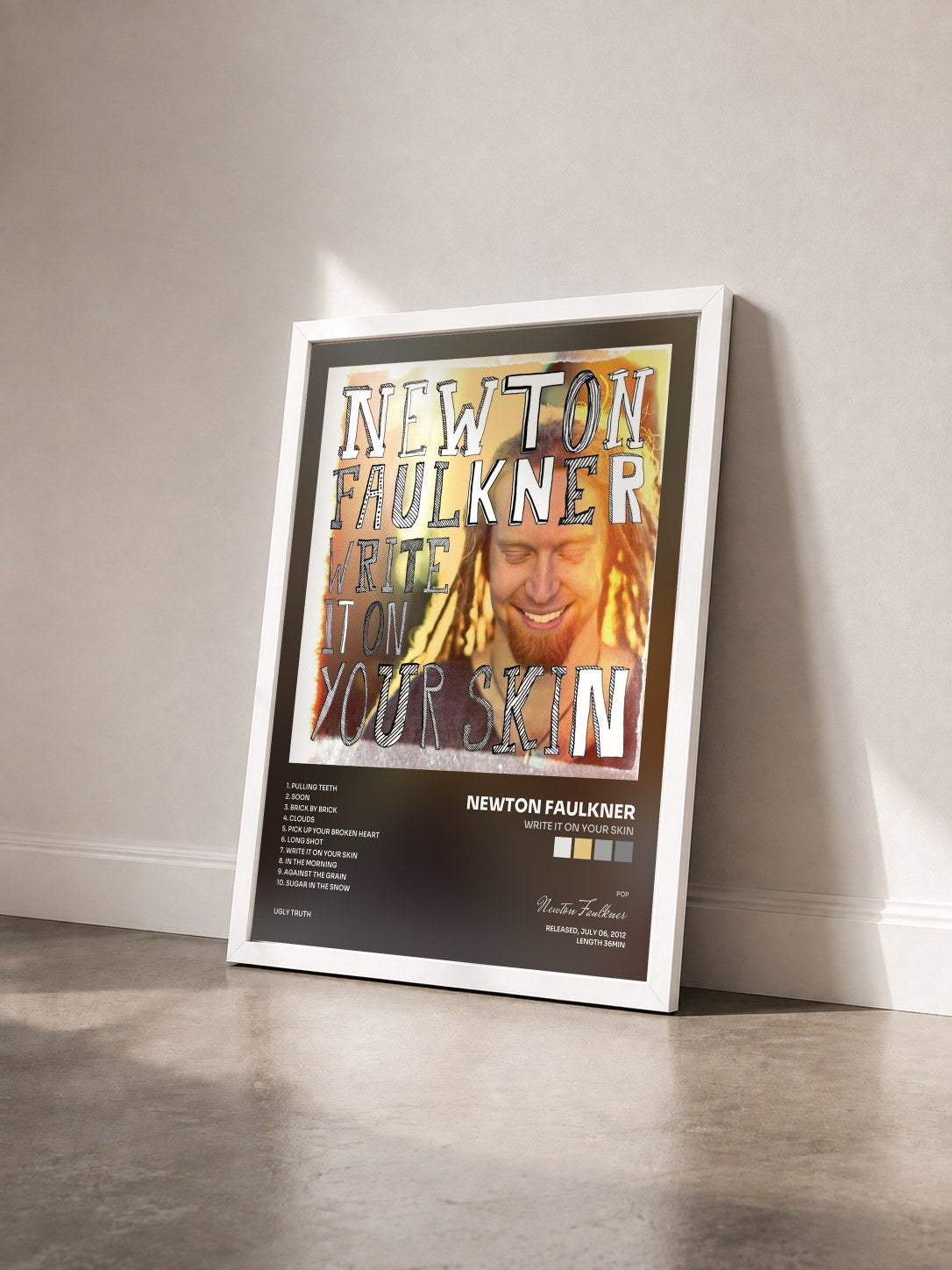 #blanc Tableau de l'album Write It On Your Skin de Newton Faulkner vu de trois quarts, cadre blanc