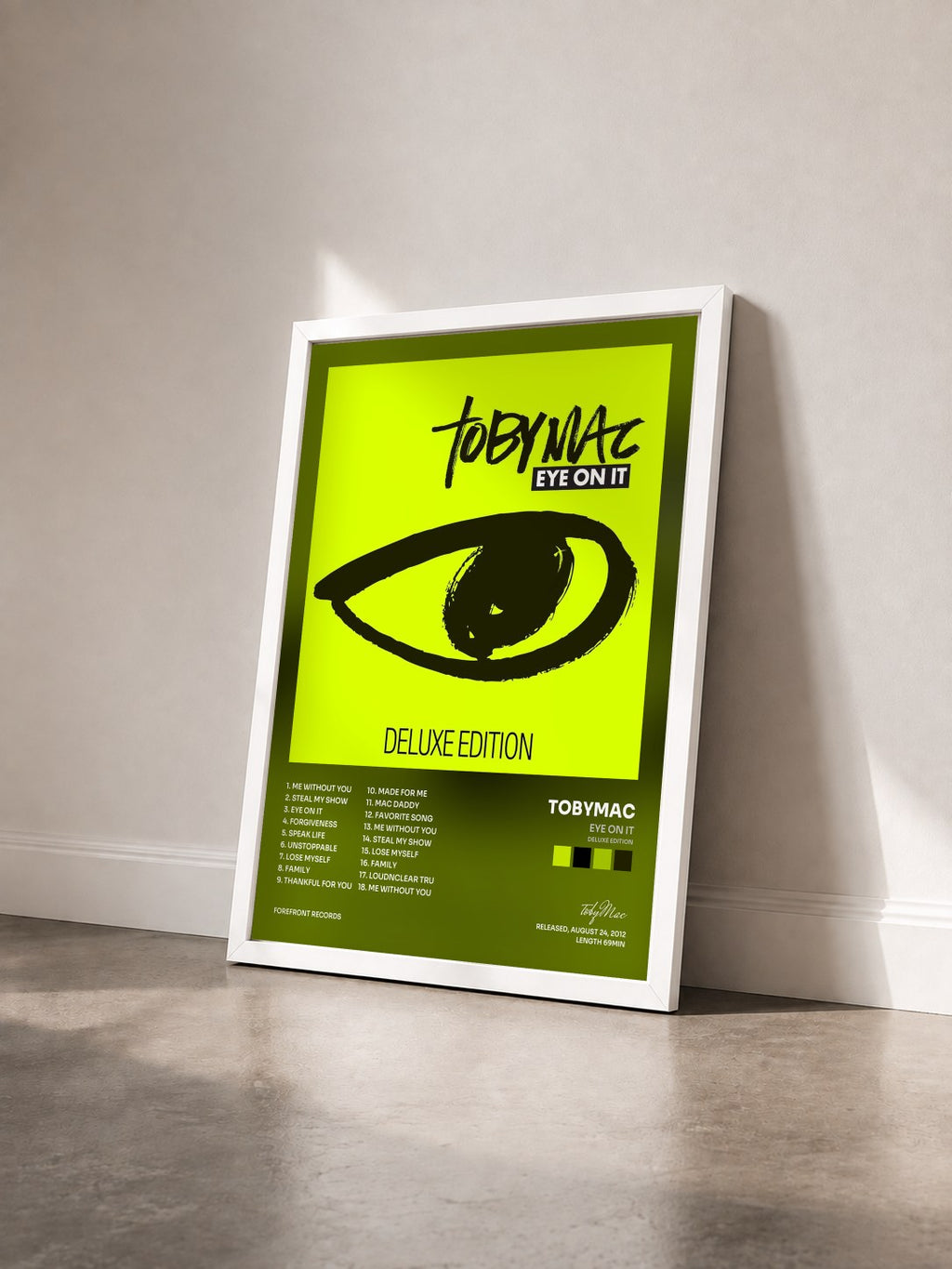 #blanc Tableau de l'album Eye On It (Deluxe Edition) de tobyMac vu de trois quarts, cadre blanc