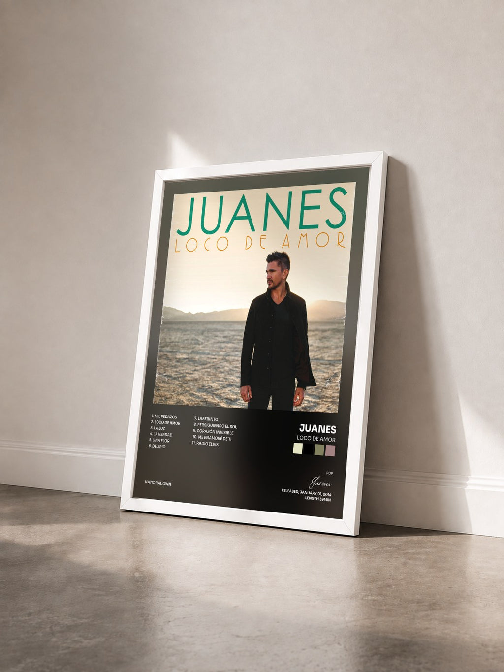 #blanc Tableau de l'album Loco De Amor de Juanes vu de trois quarts, cadre blanc