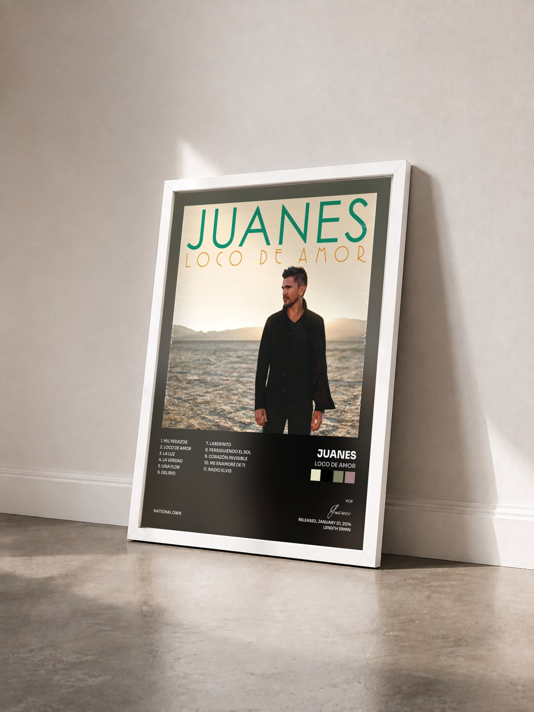 #blanc Tableau de l'album Loco De Amor de Juanes vu de trois quarts, cadre blanc