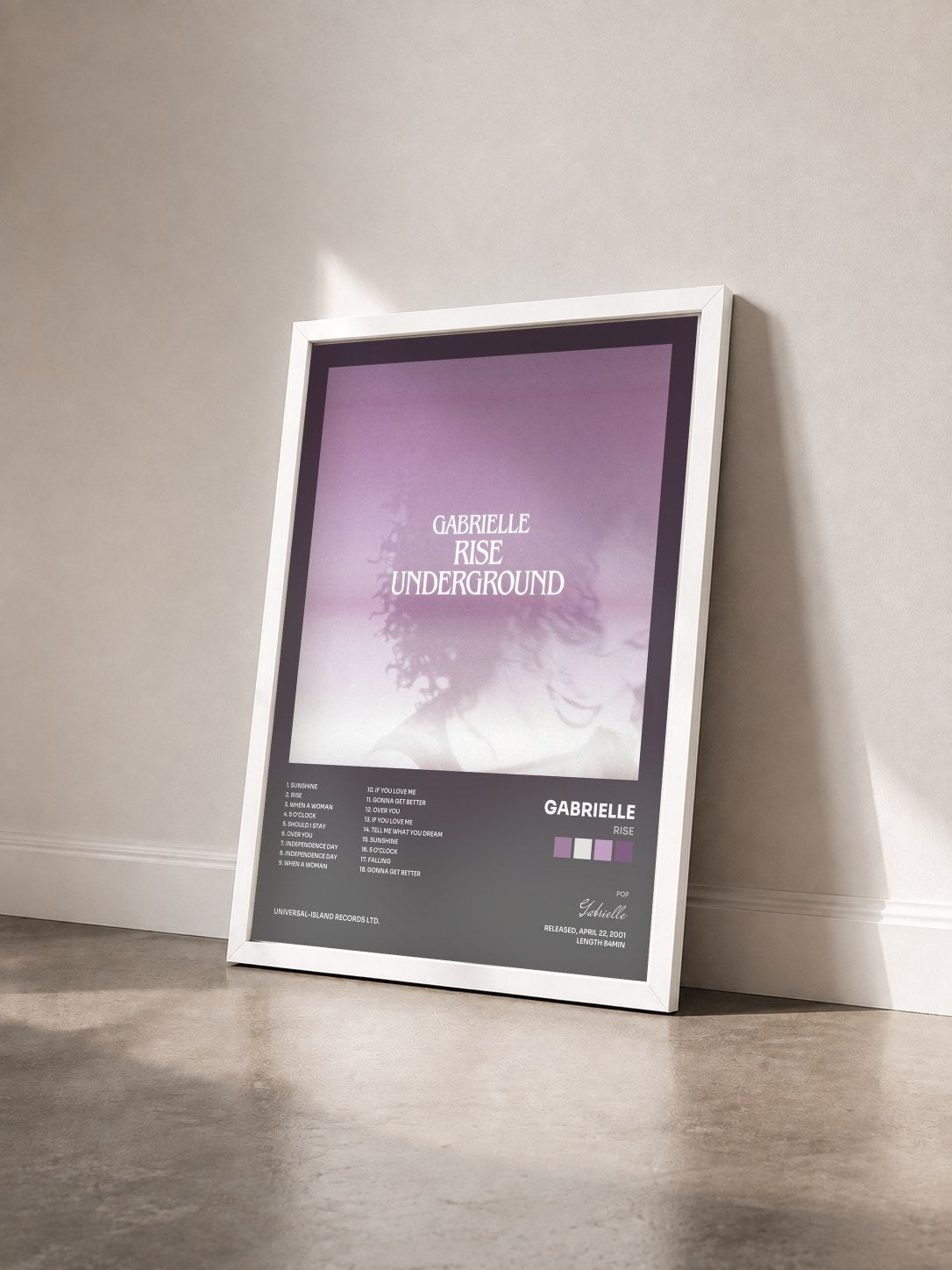 #blanc Tableau de l'album Rise de Gabrielle vu de trois quarts, cadre blanc