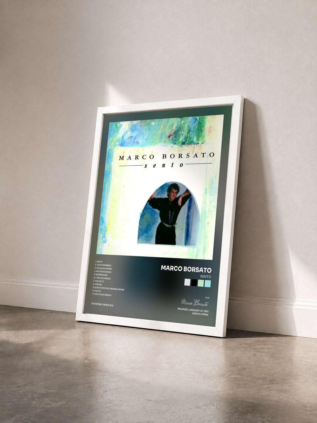 #blanc Tableau de l'album Sento de Marco Borsato vu de trois quarts, cadre blanc