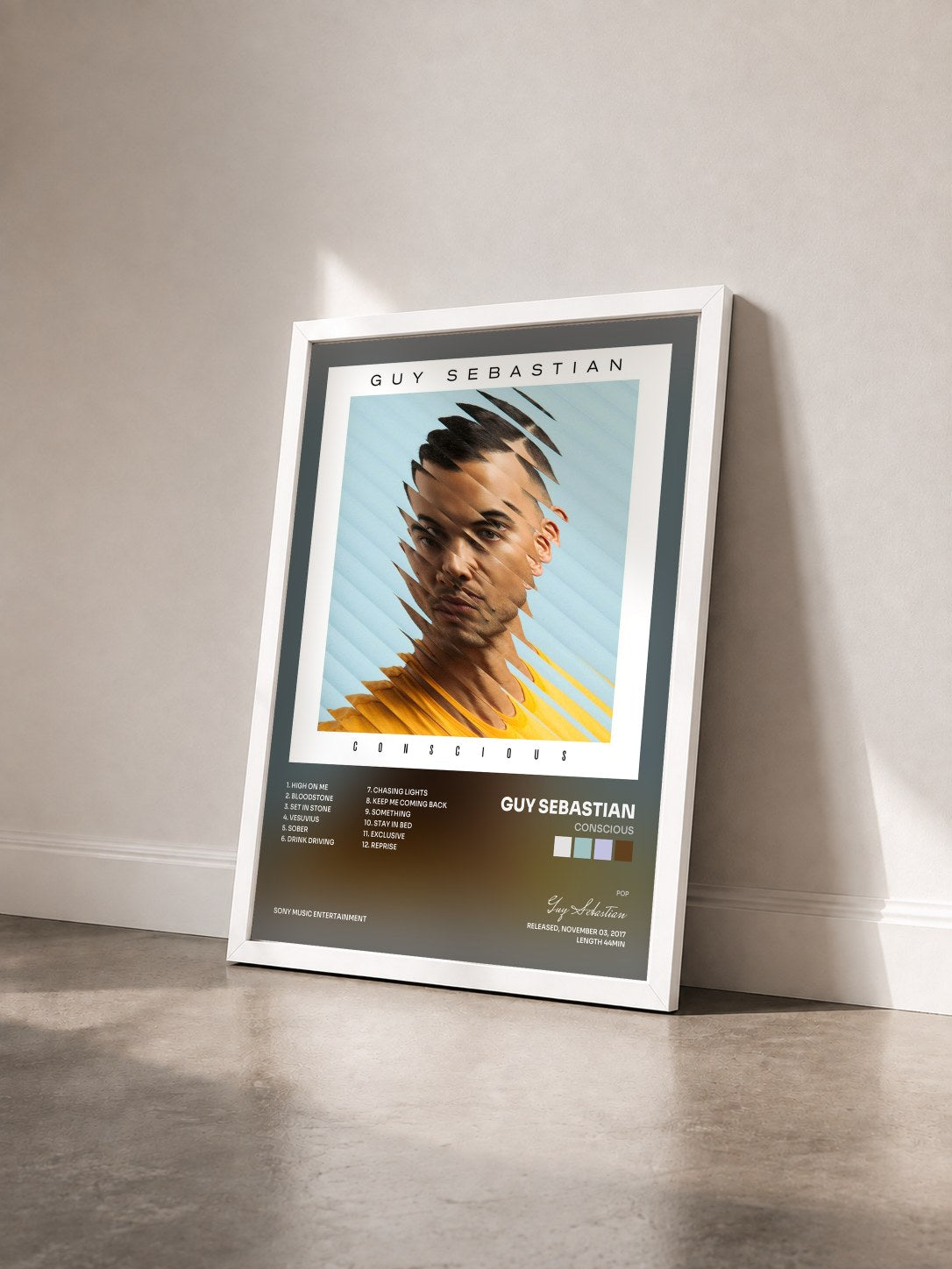 #blanc Tableau de l'album Conscious de Guy Sebastian vu de trois quarts, cadre blanc