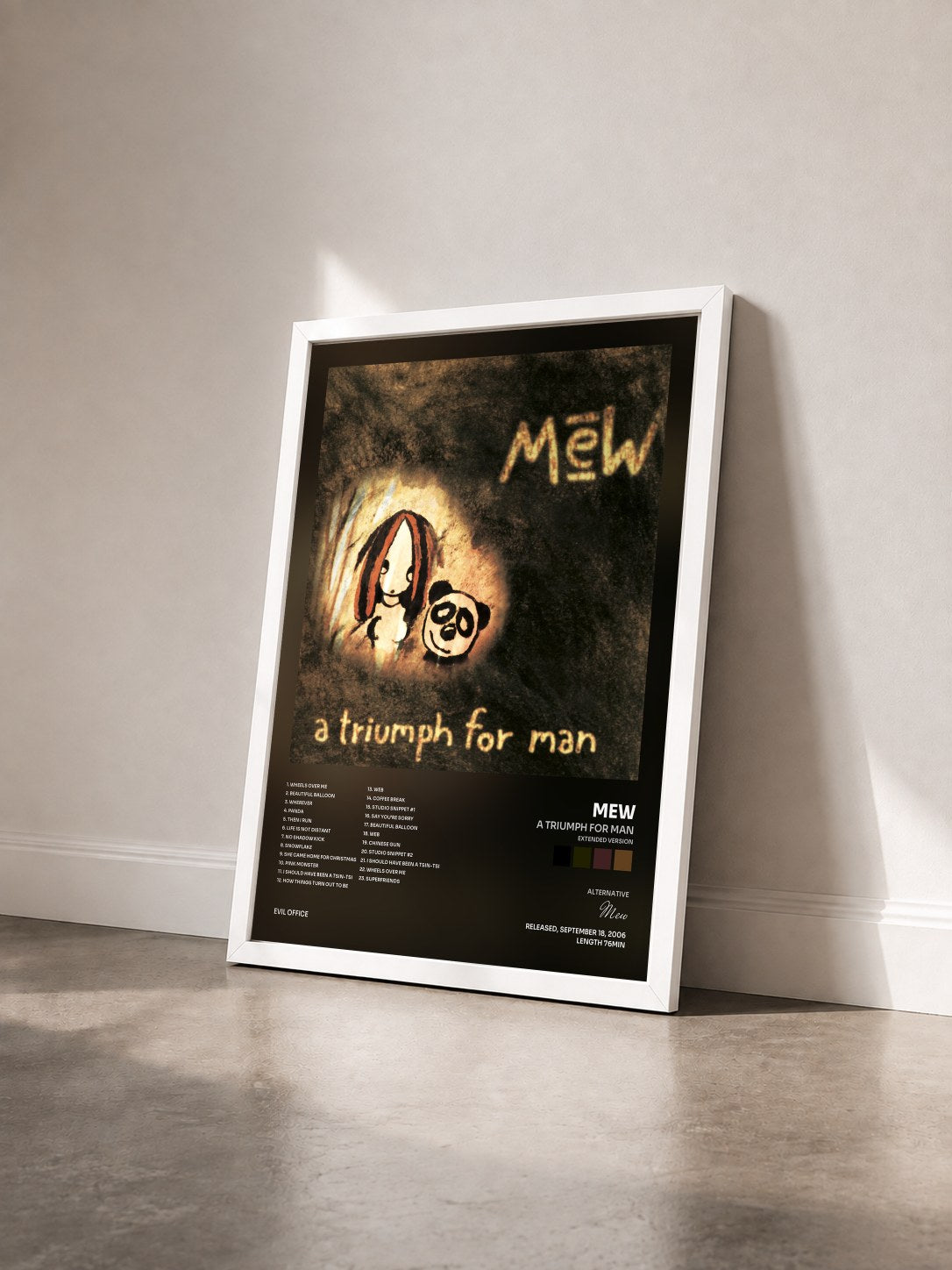 #blanc Tableau de l'album A Triumph for Man (Extended Version) de Mew vu de trois quarts, cadre blanc