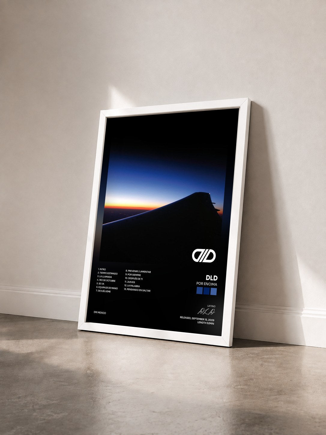 #blanc Tableau de l'album Por Encima de DLD vu de trois quarts, cadre blanc
