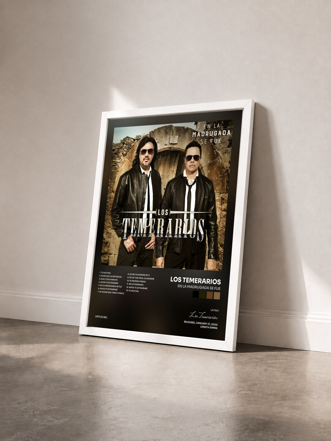 #blanc Tableau de l'album En la Madrugada Se Fue de Los Temerarios vu de trois quarts, cadre blanc