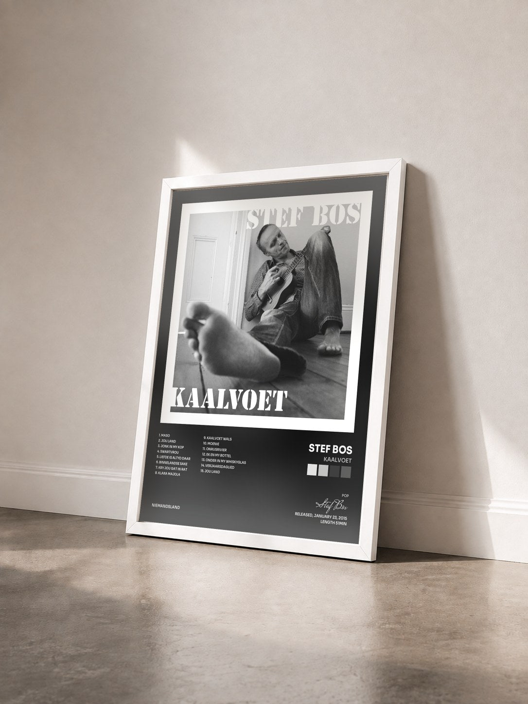 #blanc Tableau de l'album Kaalvoet de Stef Bos vu de trois quarts, cadre blanc