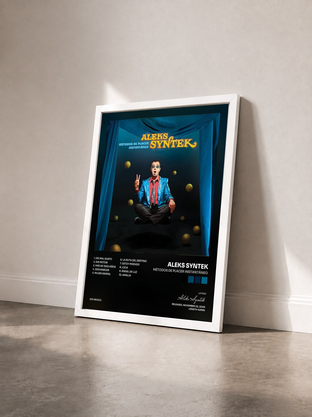 #blanc Tableau de l'album Métodos De Placer Instantáneo de Aleks Syntek vu de trois quarts, cadre blanc