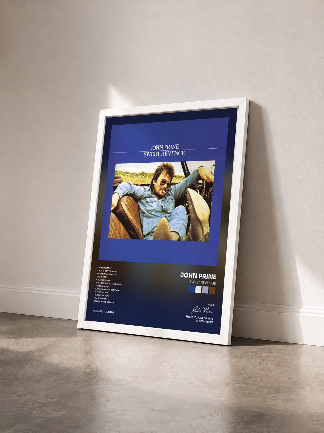 #blanc Tableau de l'album Sweet Revenge de John Prine vu de trois quarts, cadre blanc