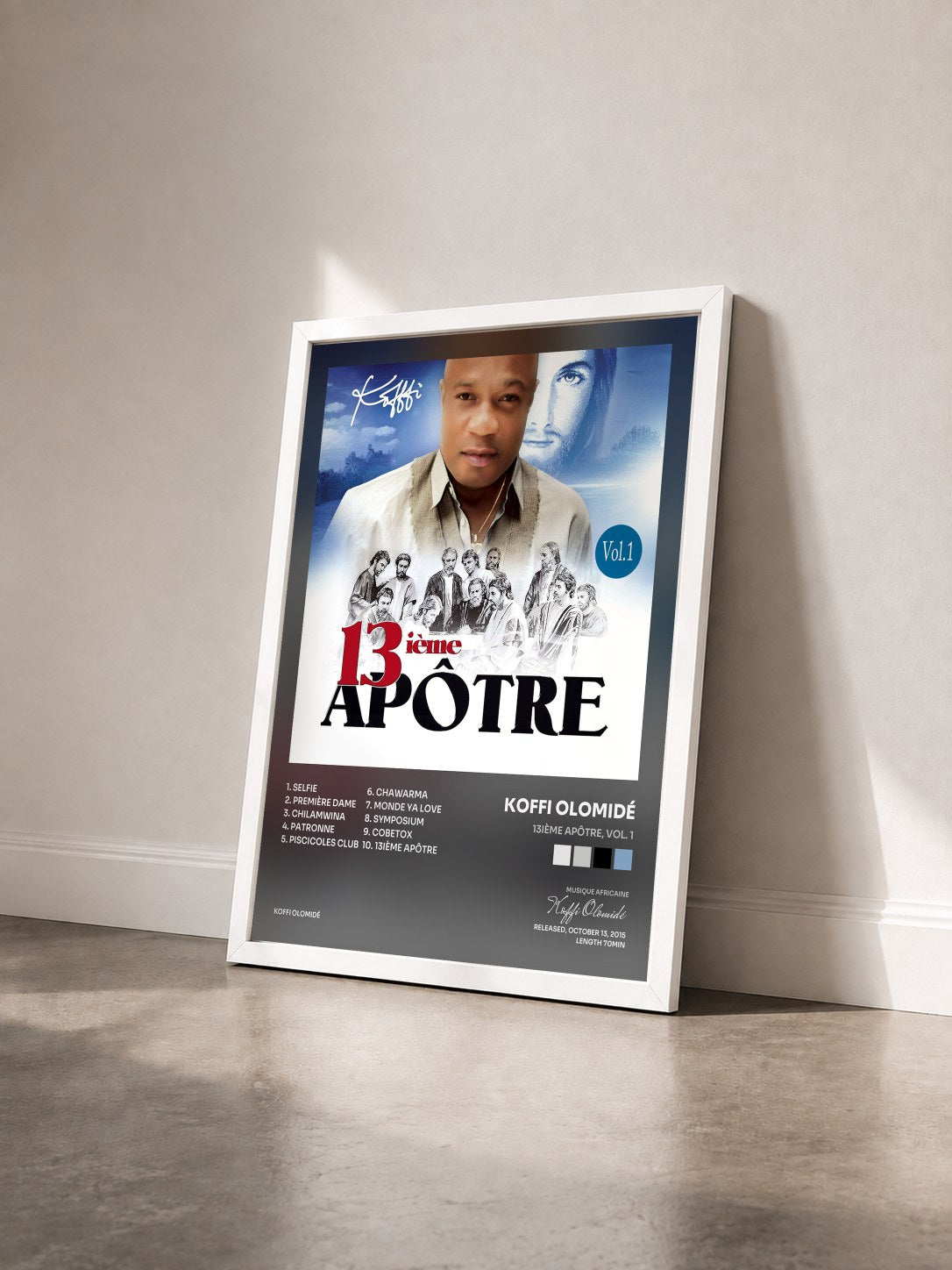 #blanc Tableau de l'album 13ième apôtre, Vol. 1 de Koffi Olomidé vu de trois quarts, cadre blanc
