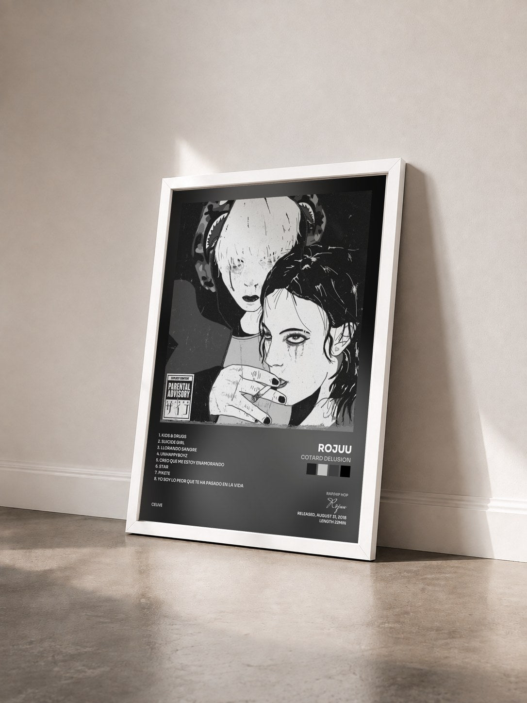 #blanc Tableau de l'album Cotard Delusion de Rojuu vu de trois quarts, cadre blanc