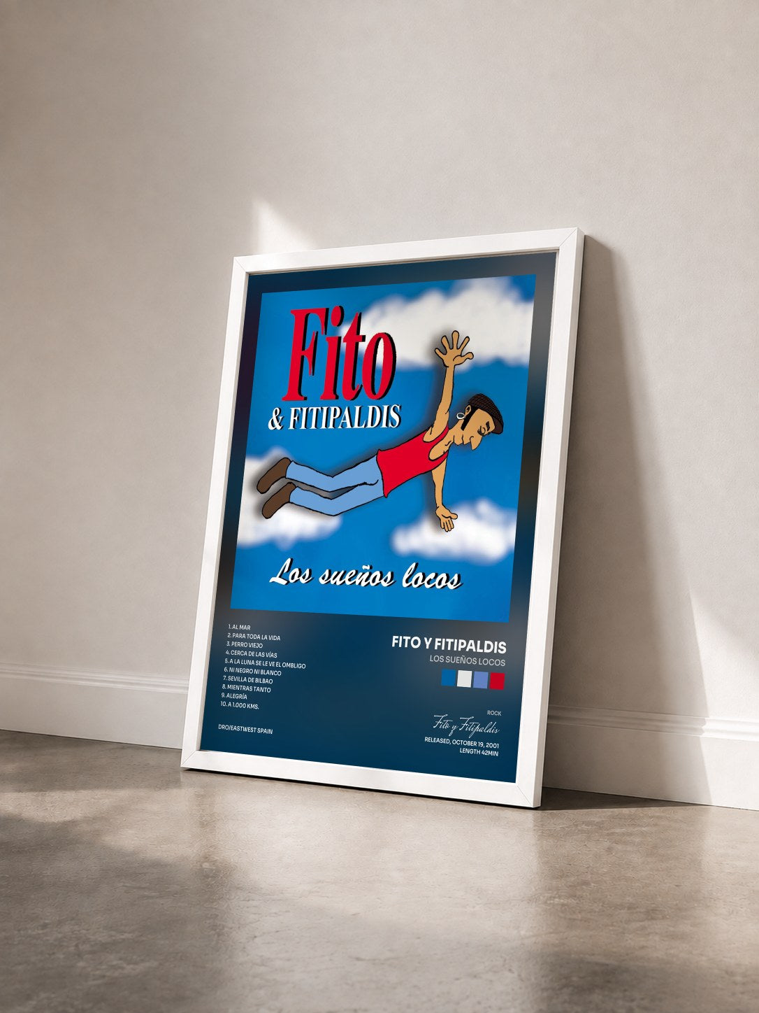 #blanc Tableau de l'album Los Sueños Locos de Fito y Fitipaldis vu de trois quarts, cadre blanc