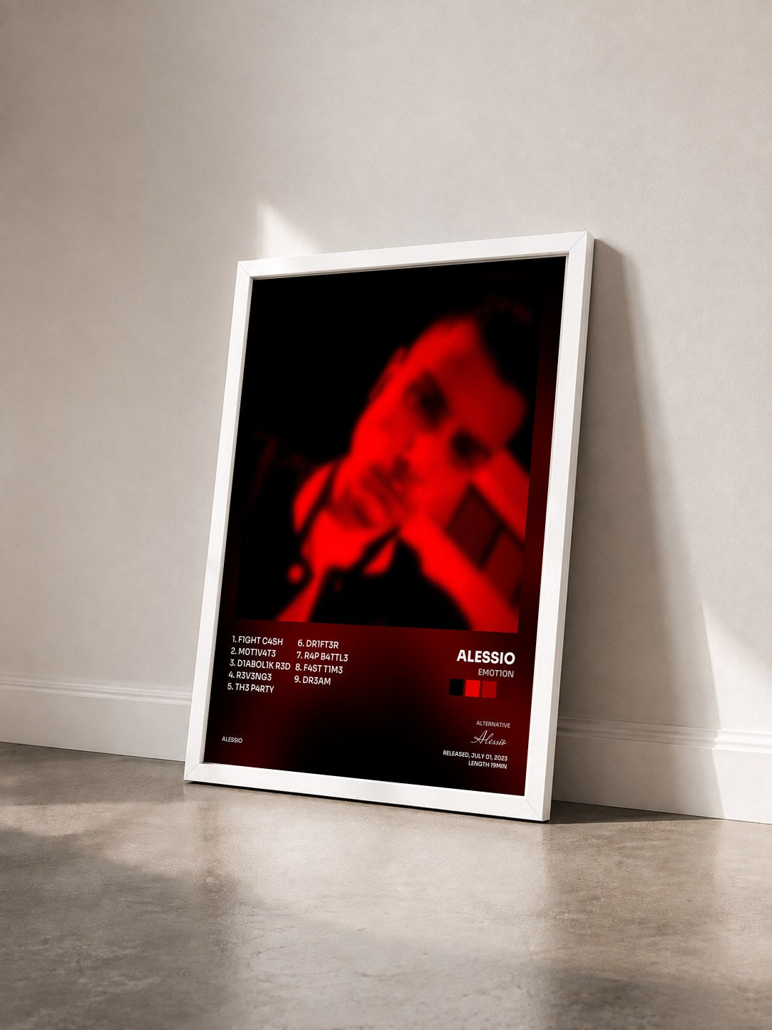 #blanc Tableau de l'album Em0t10n de Alessio vu de trois quarts, cadre blanc