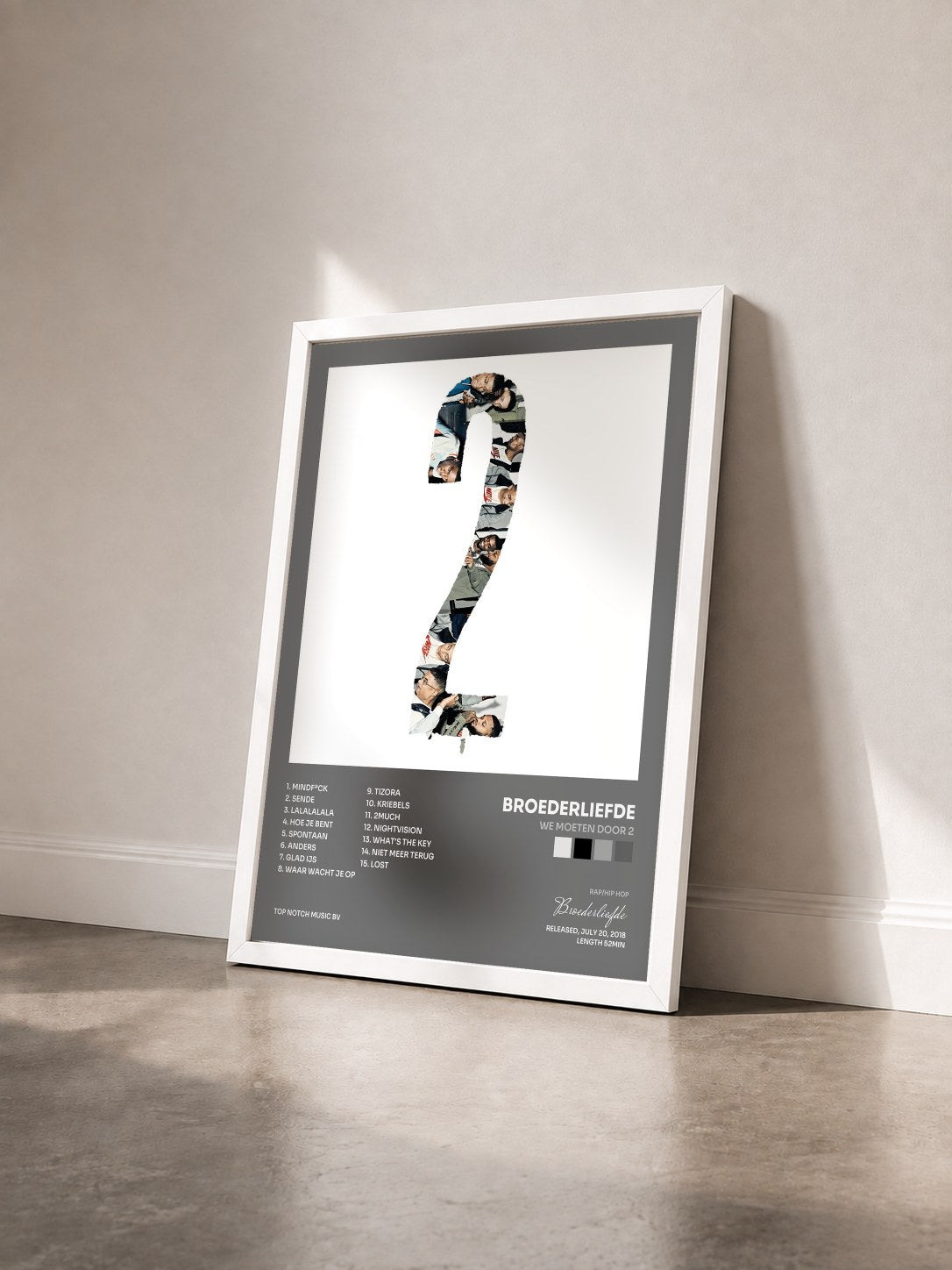 #blanc Tableau de l'album We Moeten Door 2 de Broederliefde vu de trois quarts, cadre blanc