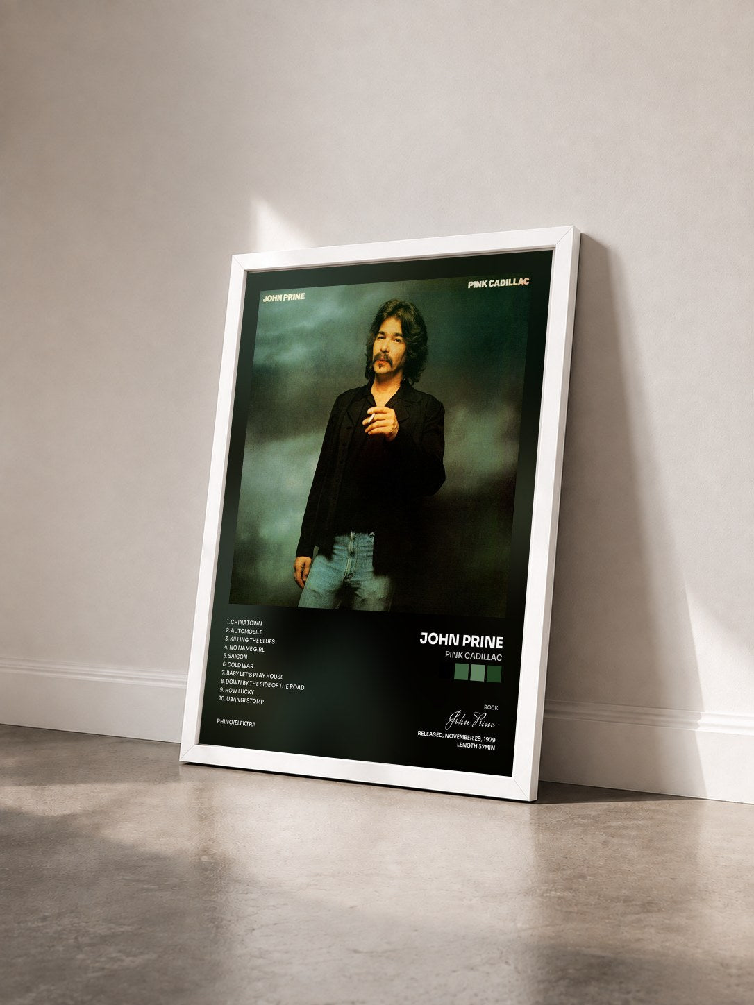 #blanc Tableau de l'album Pink Cadillac de John Prine vu de trois quarts, cadre blanc