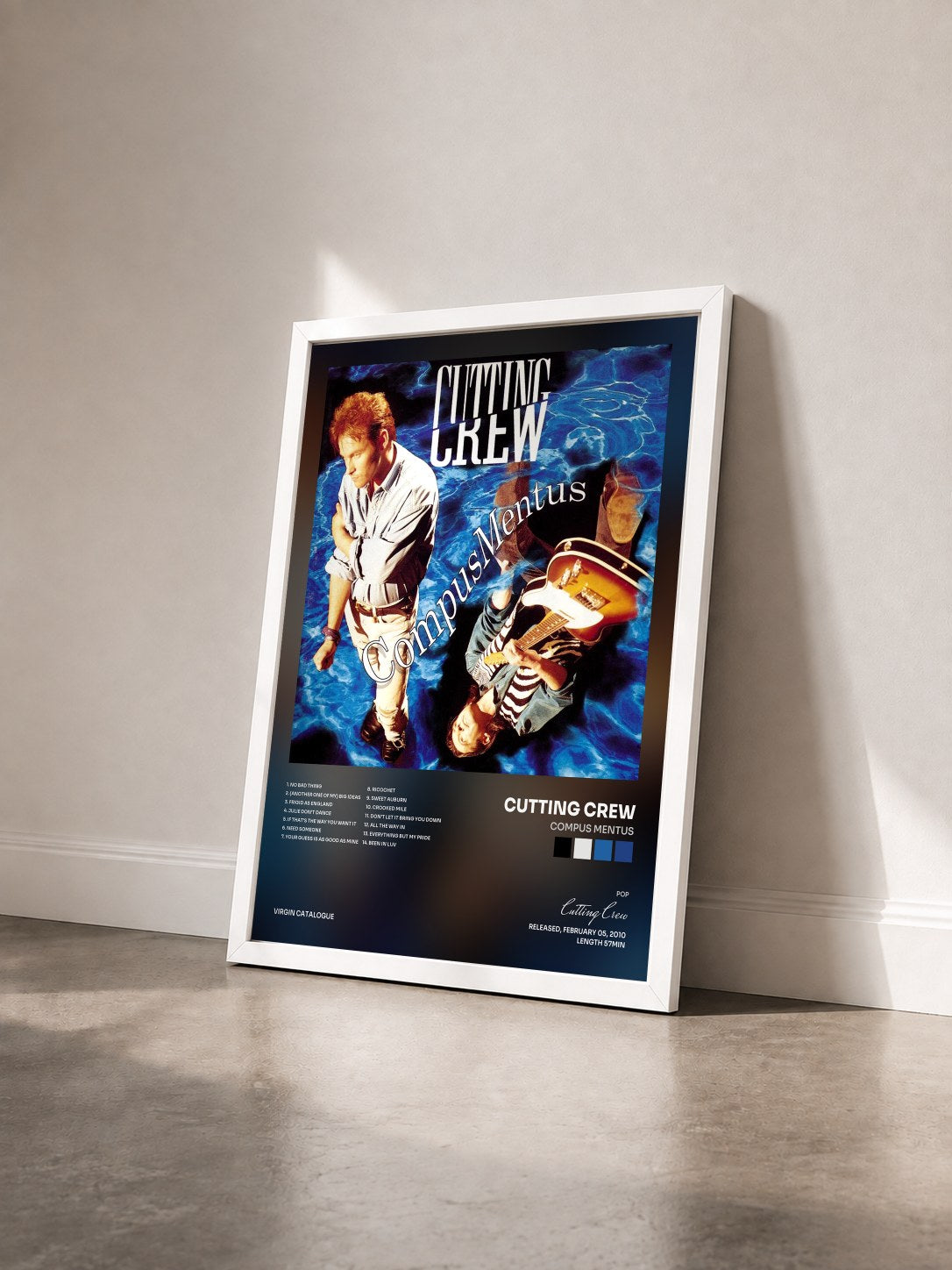 #blanc Tableau de l'album Compus Mentus de Cutting Crew vu de trois quarts, cadre blanc