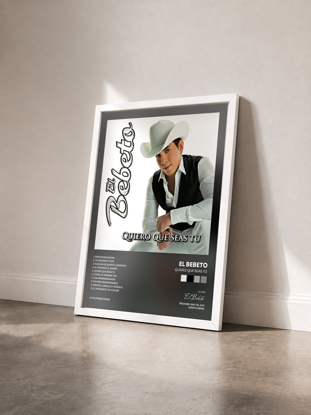 #blanc Quiero Que Seas Tú by El Bebeto as a framed art print seen at an angle, white frame