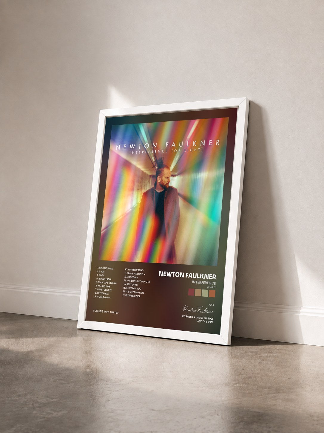 #blanc Tableau de l'album Interference (Of Light) de Newton Faulkner vu de trois quarts, cadre blanc