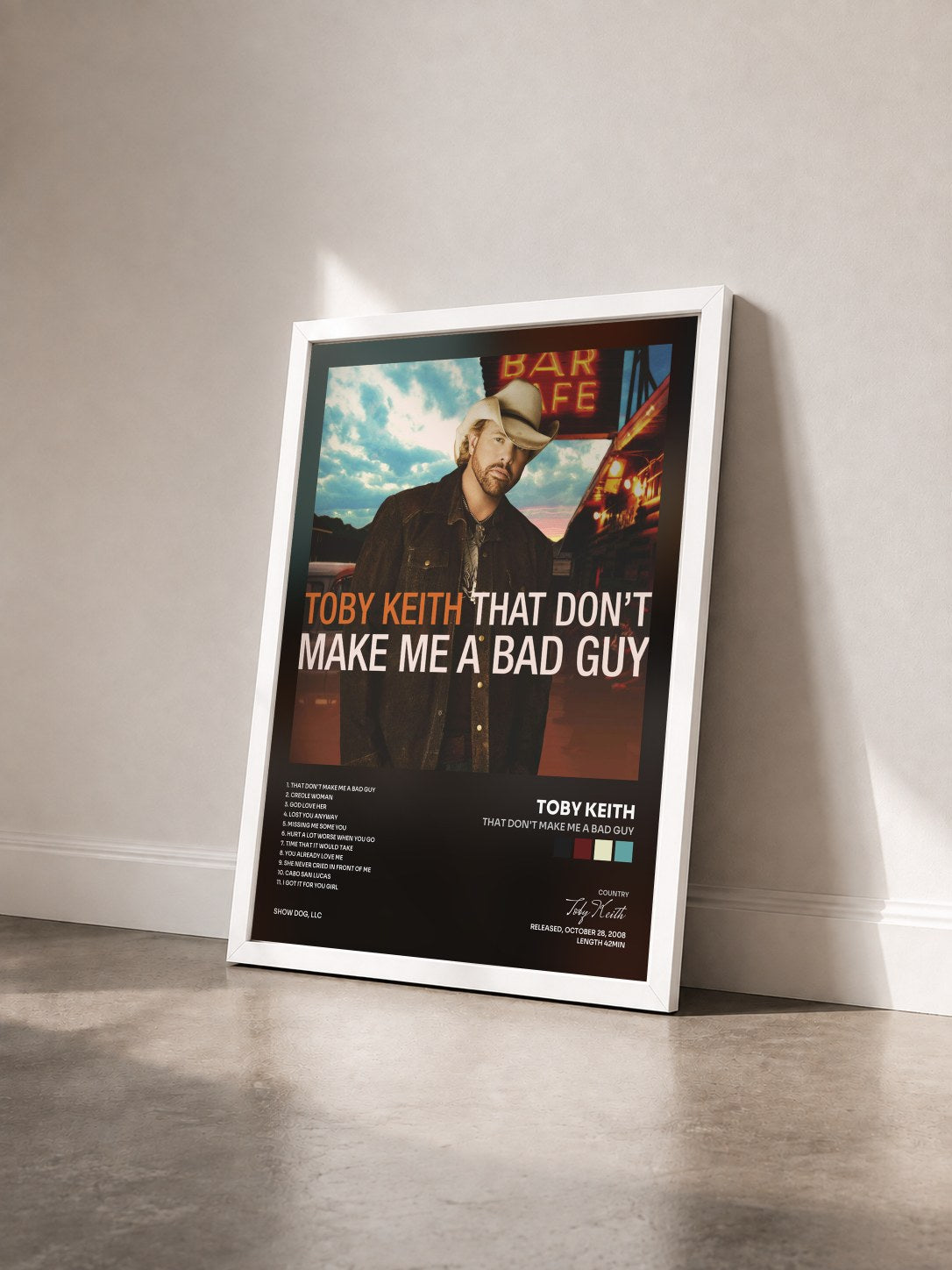 #blanc Tableau de l'album That Don't Make Me a Bad Guy de Toby Keith vu de trois quarts, cadre blanc