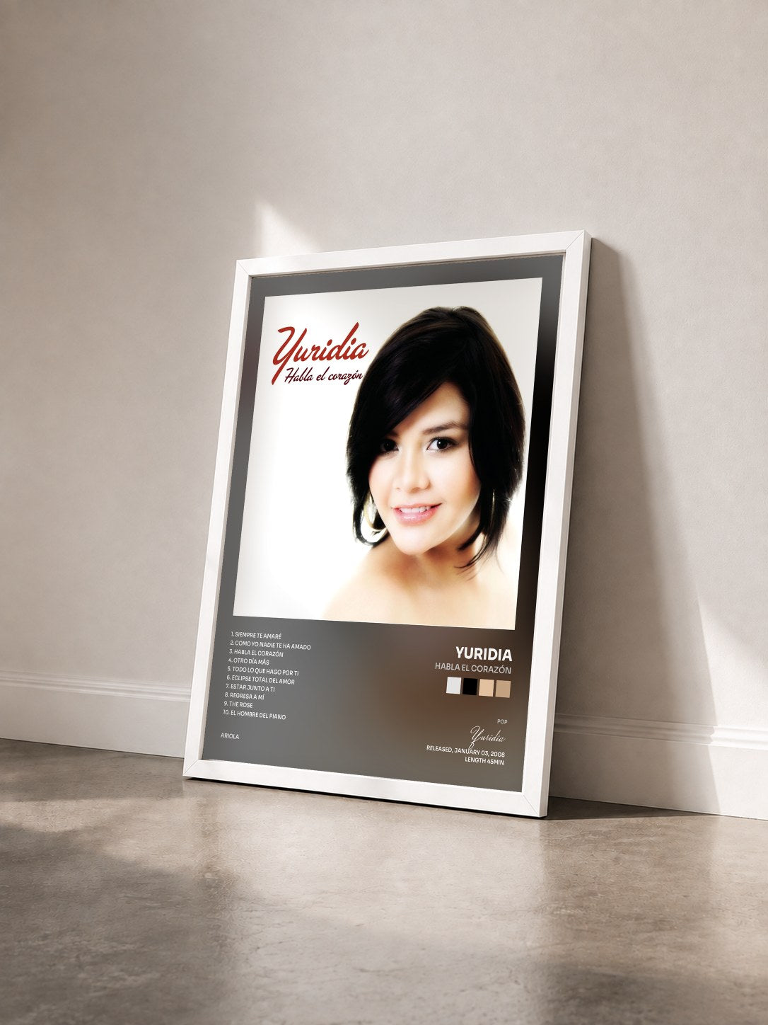#blanc Tableau de l'album Habla el Corazón de Yuridia vu de trois quarts, cadre blanc