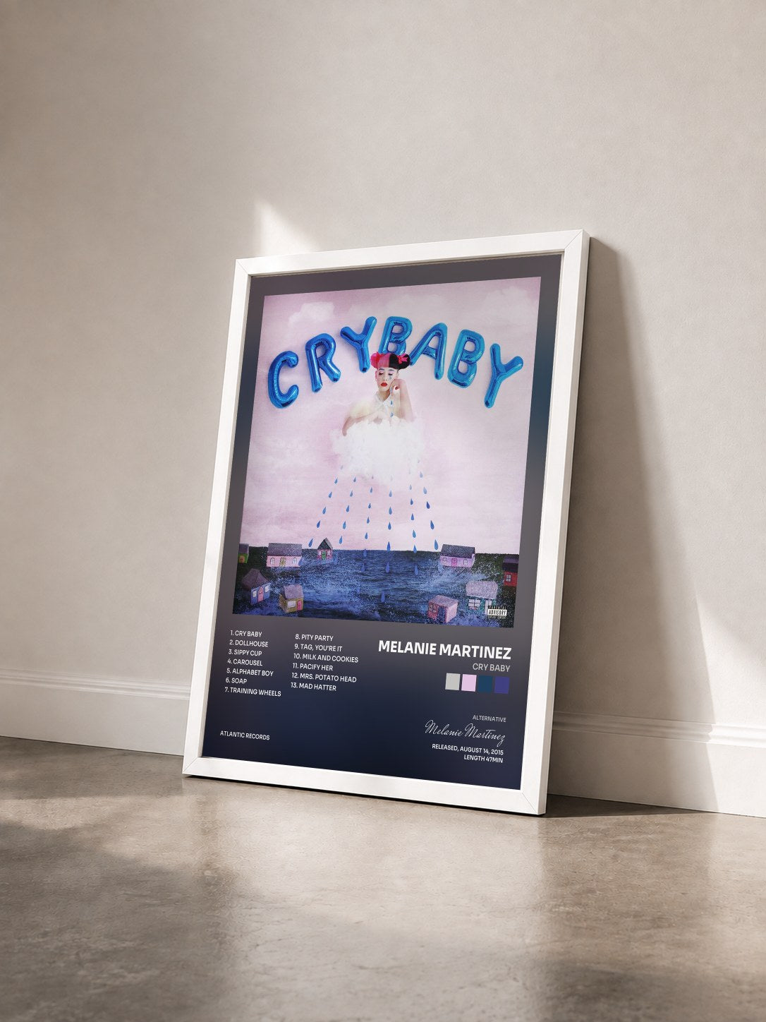 #blanc Tableau de l'album Cry Baby de Melanie Martinez vu de trois quarts, cadre blanc