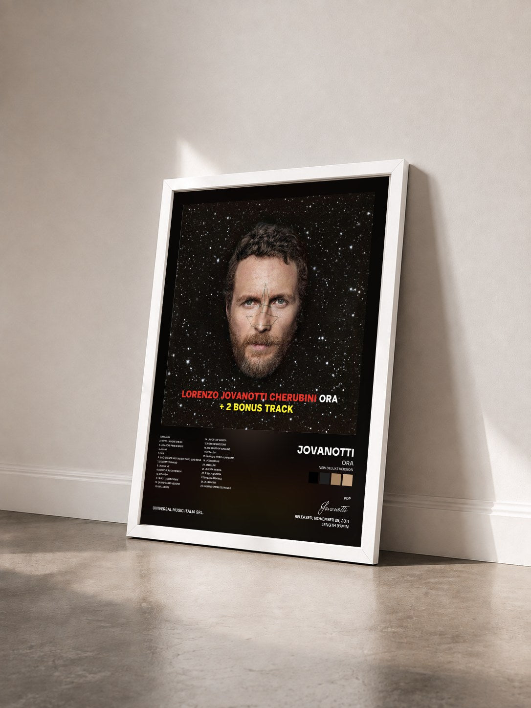 #blanc Tableau de l'album Ora (New Deluxe Version) de Jovanotti vu de trois quarts, cadre blanc