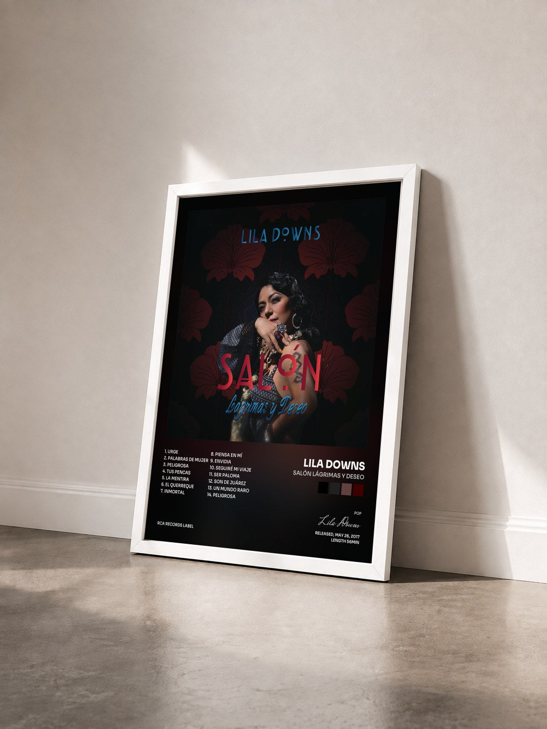 #blanc Tableau de l'album Salón Lágrimas y Deseo de Lila Downs vu de trois quarts, cadre blanc