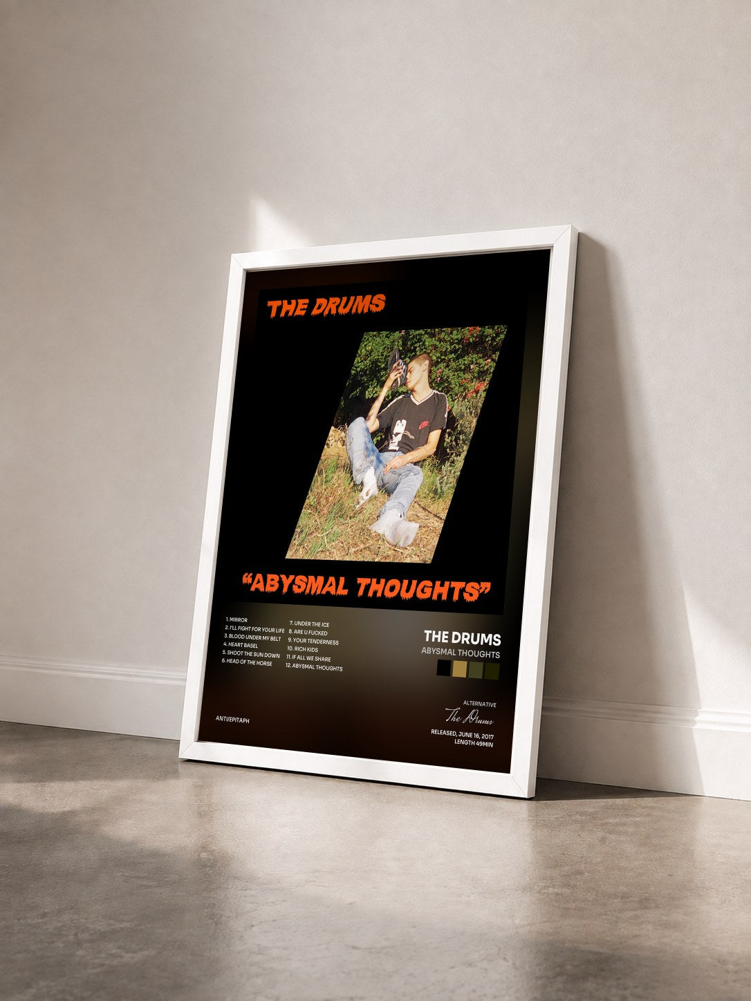 #blanc Tableau de l'album Abysmal Thoughts de The Drums vu de trois quarts, cadre blanc