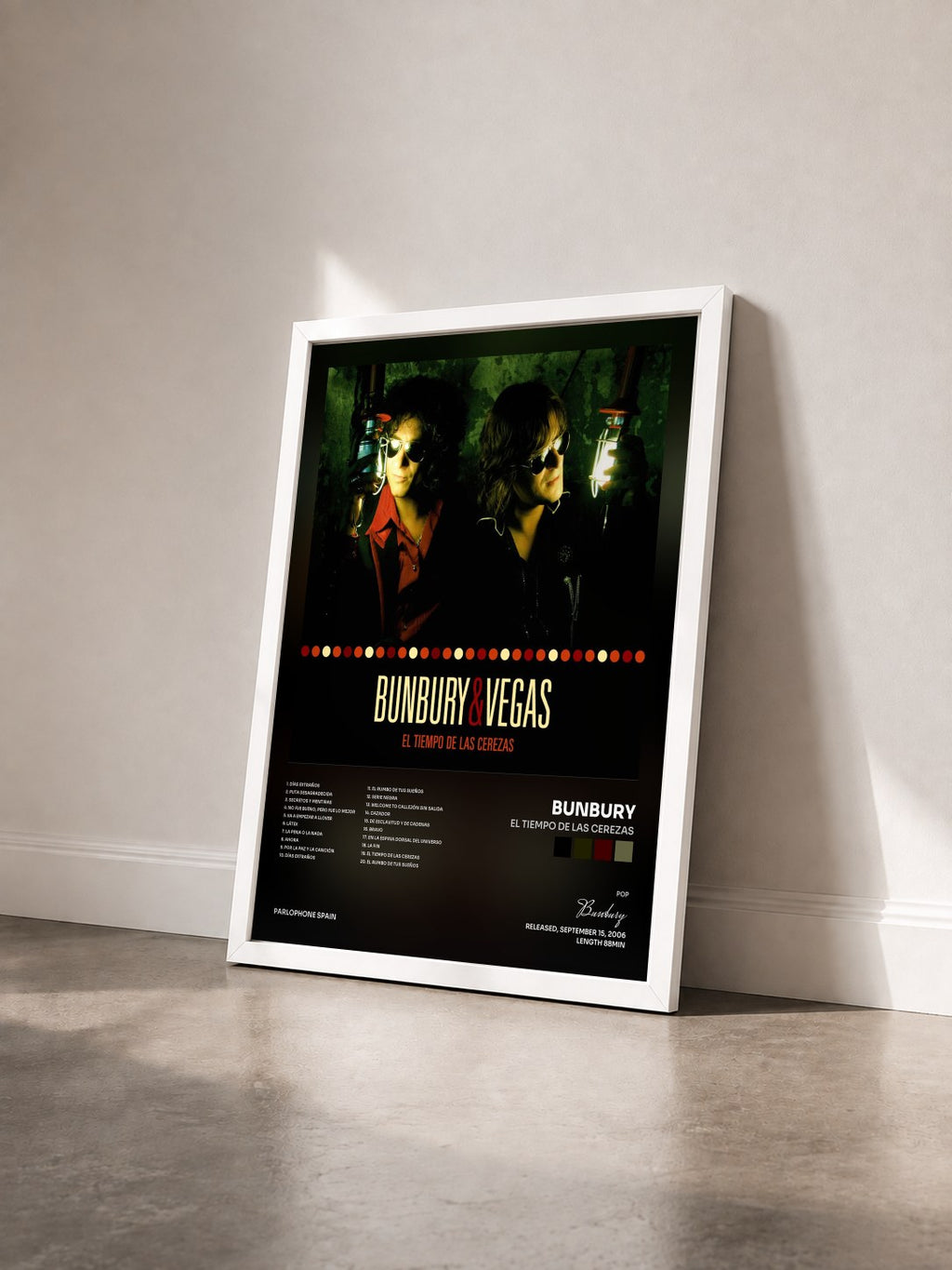 #blanc El Tiempo De Las Cerezas by Bunbury as a framed art print seen at an angle, white frame