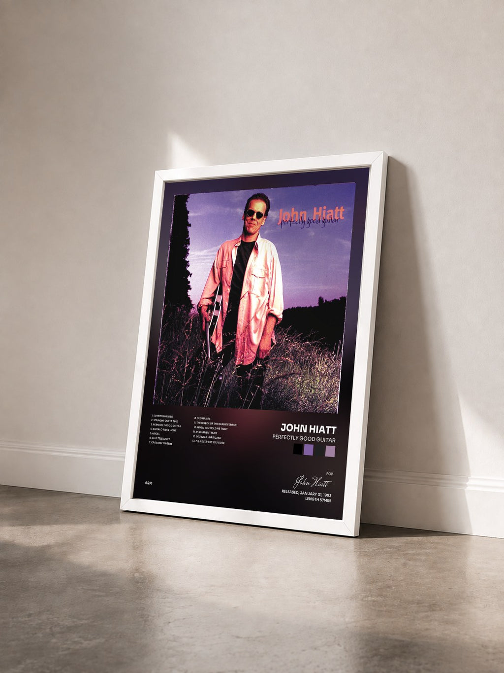 #blanc Tableau de l'album Perfectly Good Guitar de John Hiatt vu de trois quarts, cadre blanc