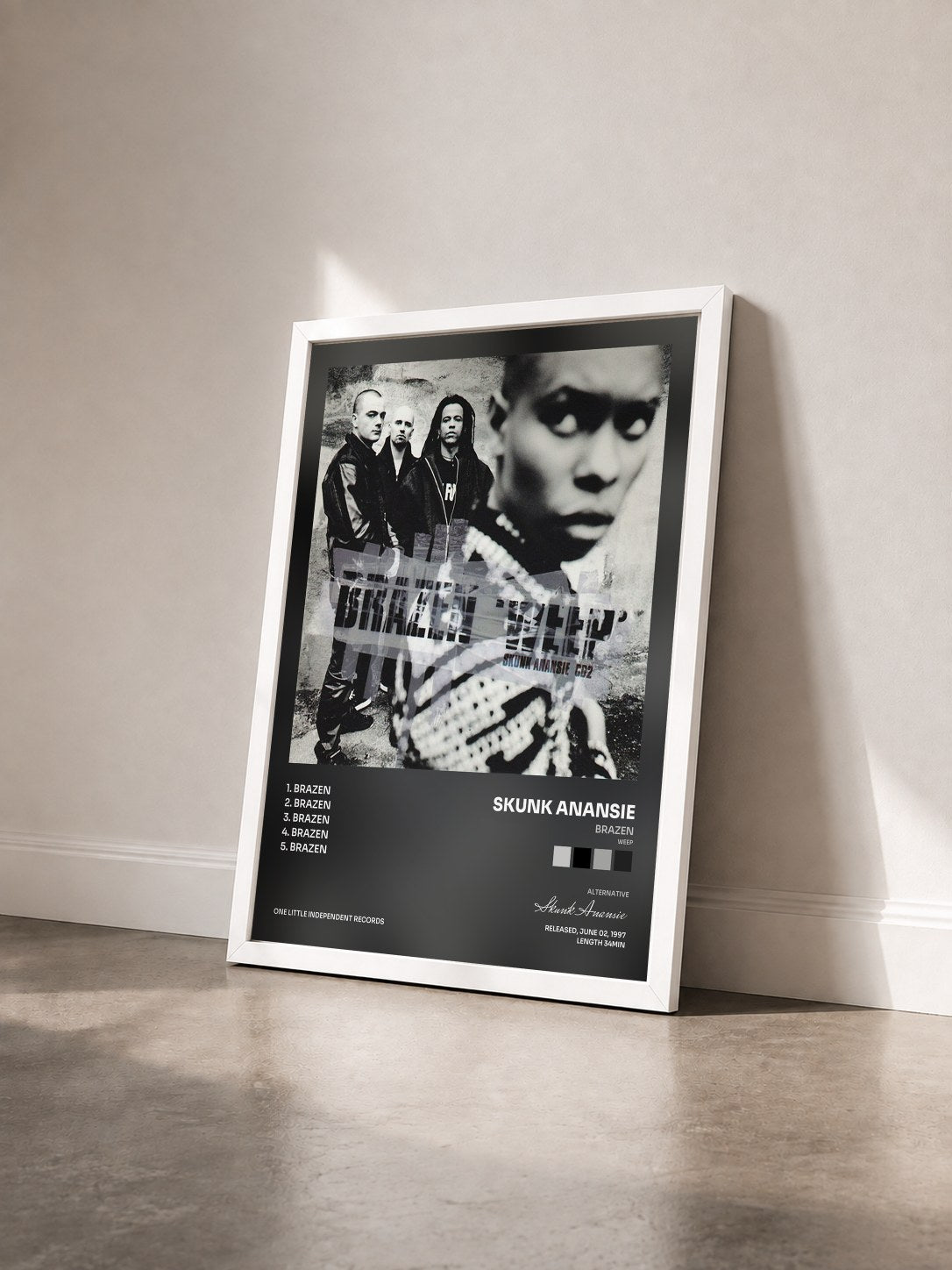 #blanc Tableau de l'album Brazen (Weep) de Skunk Anansie vu de trois quarts, cadre blanc