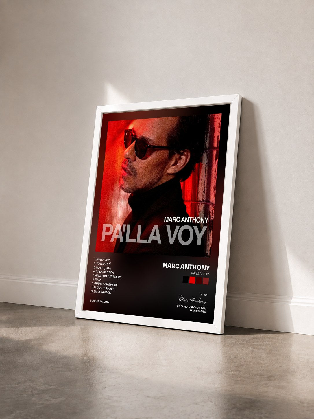#blanc Tableau de l'album Pa'lla Voy de Marc Anthony vu de trois quarts, cadre blanc