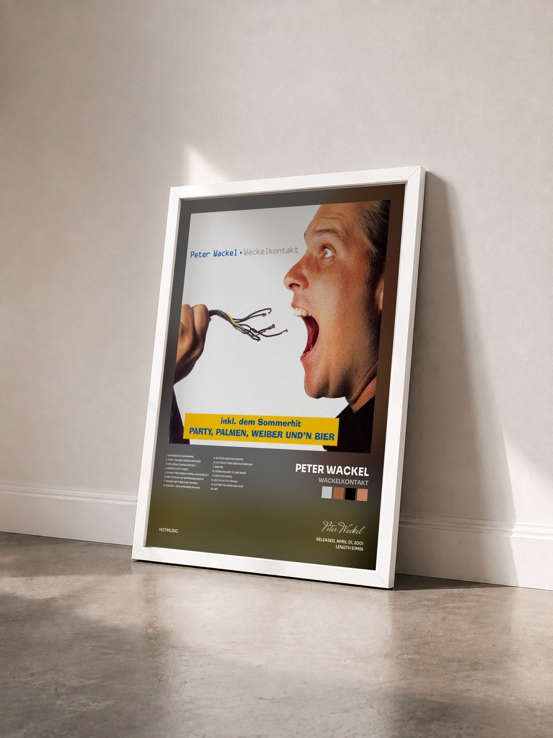 #blanc Tableau de l'album Wackelkontakt de Peter Wackel vu de trois quarts, cadre blanc