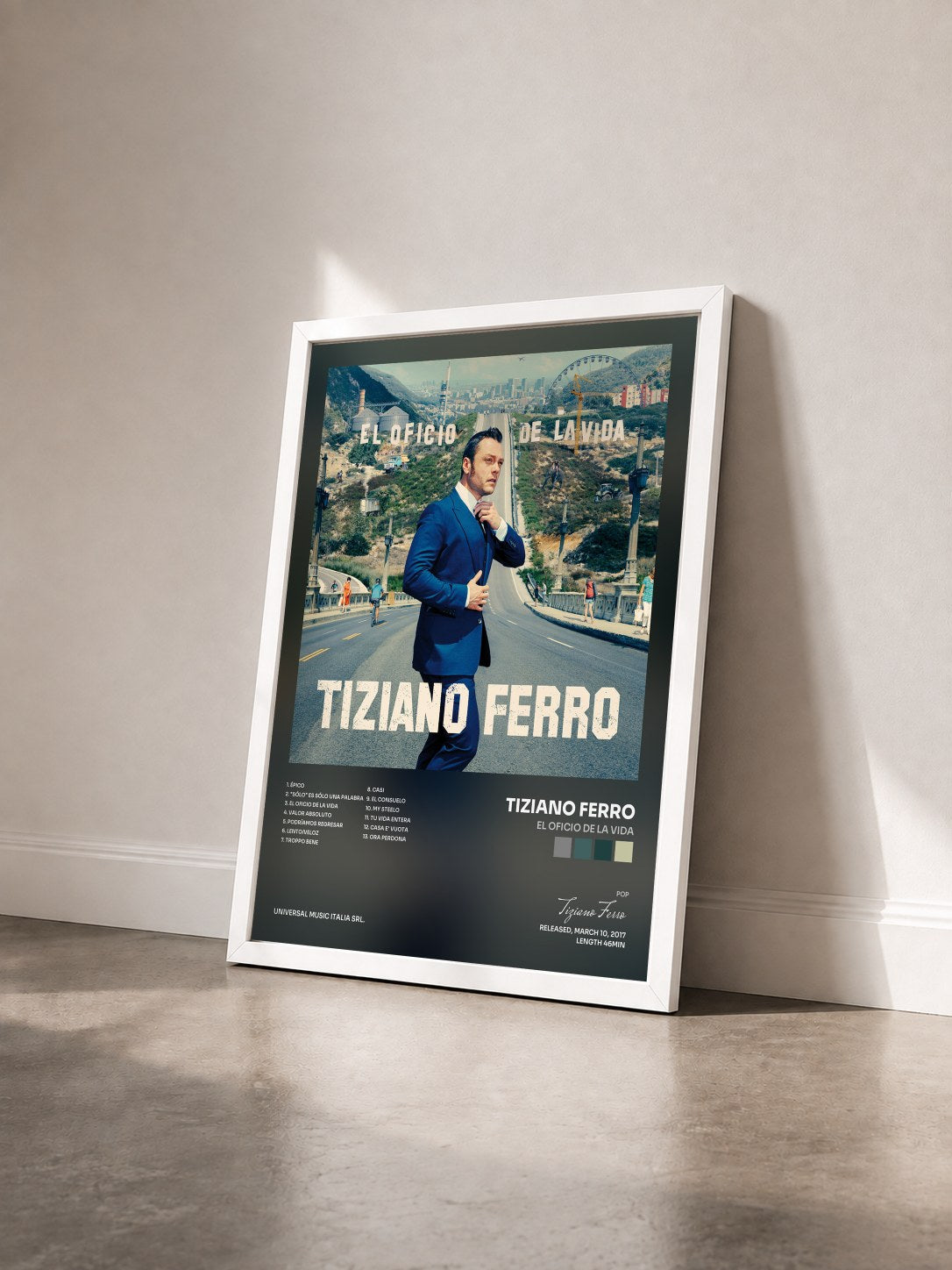 #blanc Tableau de l'album El Oficio De La Vida de Tiziano Ferro vu de trois quarts, cadre blanc
