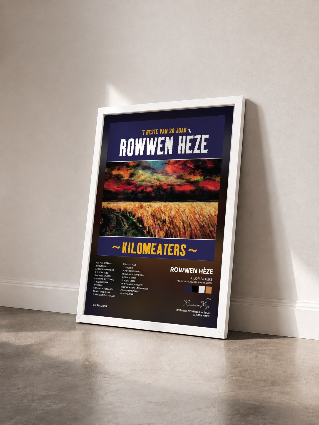 #blanc Tableau de l'album Kilomeaters ('T Beste Van 20 Joar Rowwen Hèze) de Rowwen Hèze vu de trois quarts, cadre blanc