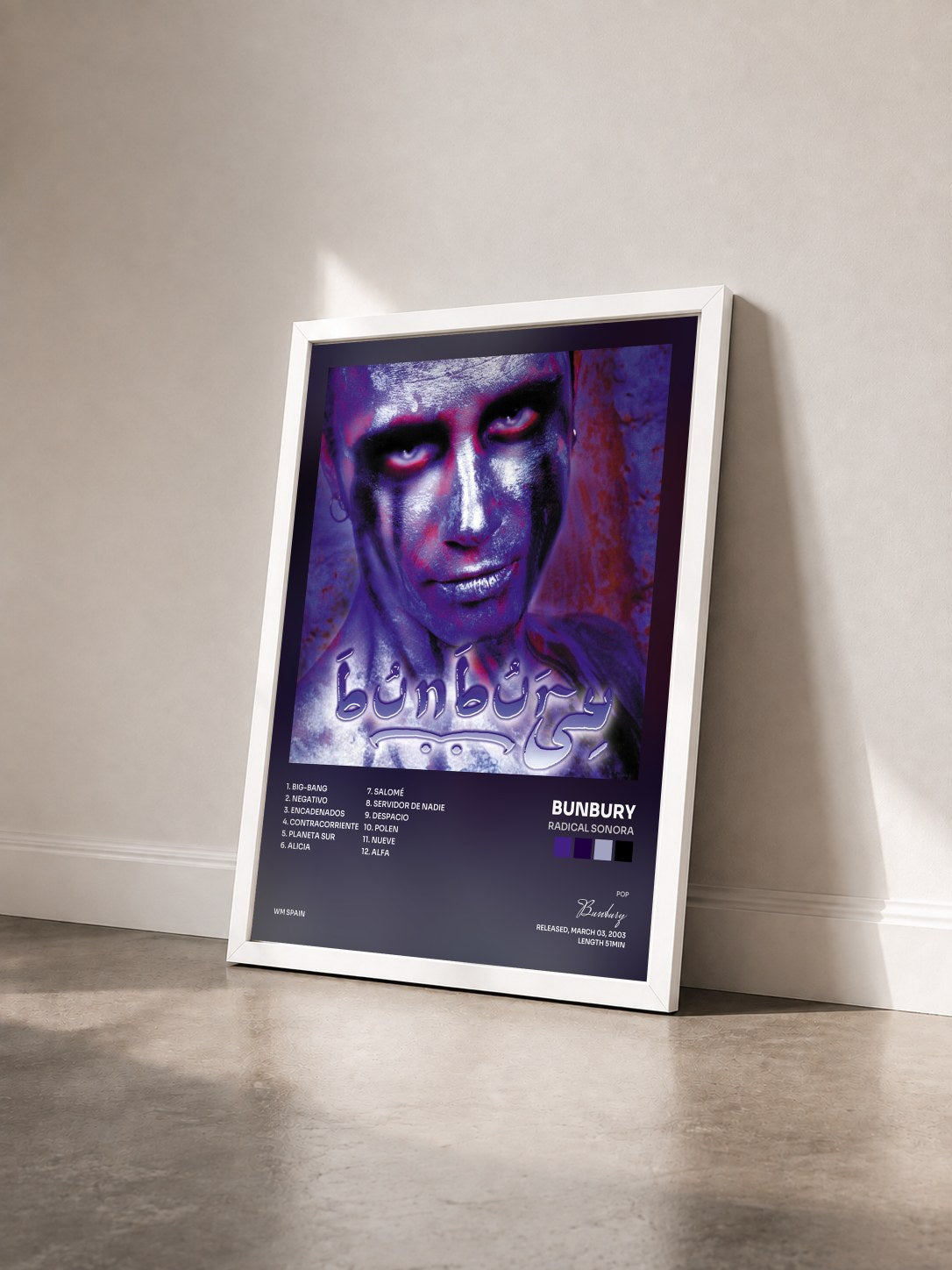 #blanc Tableau de l'album Radical Sonora de Bunbury vu de trois quarts, cadre blanc