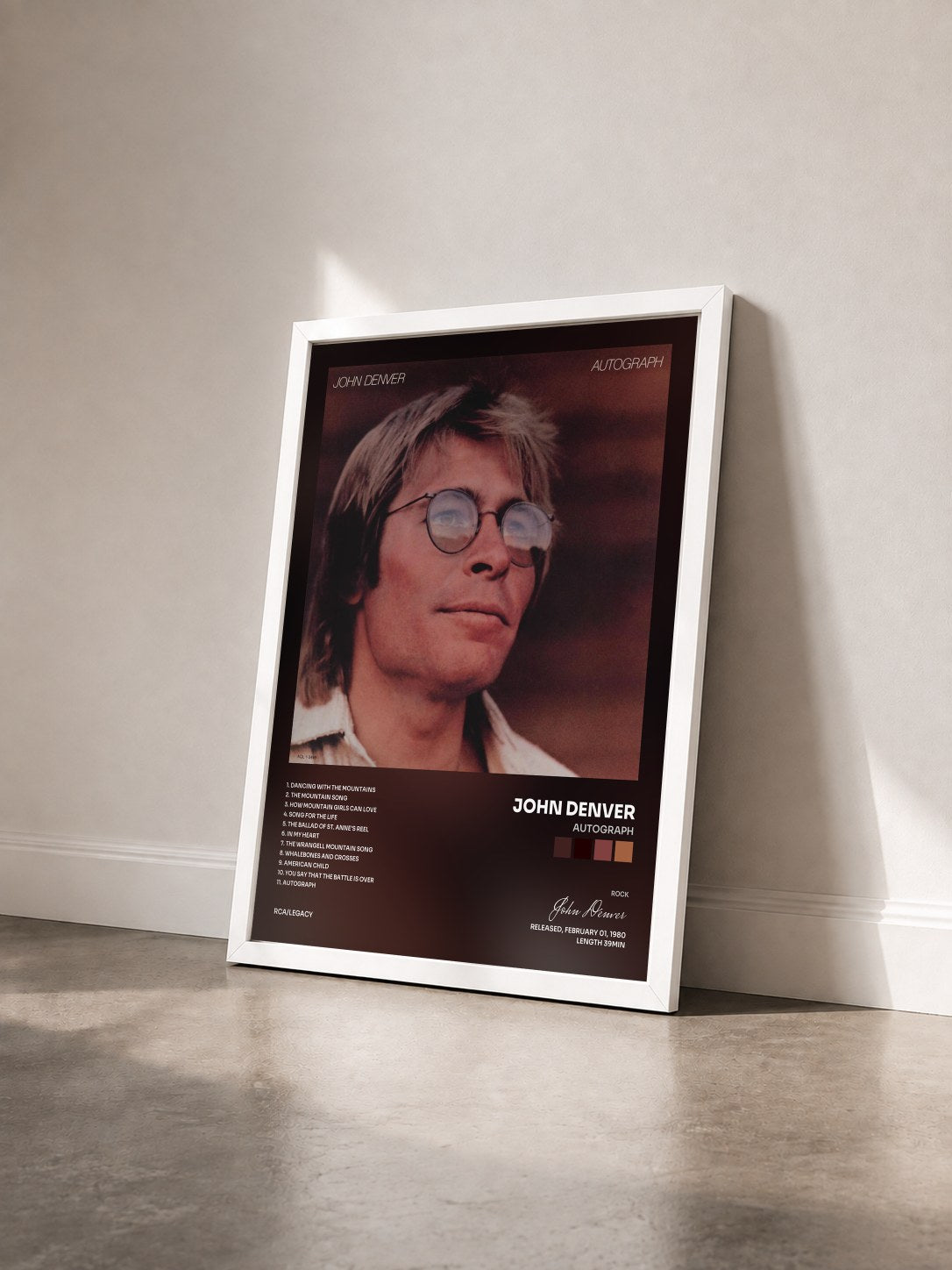 #blanc Tableau de l'album Autograph de John Denver vu de trois quarts, cadre blanc