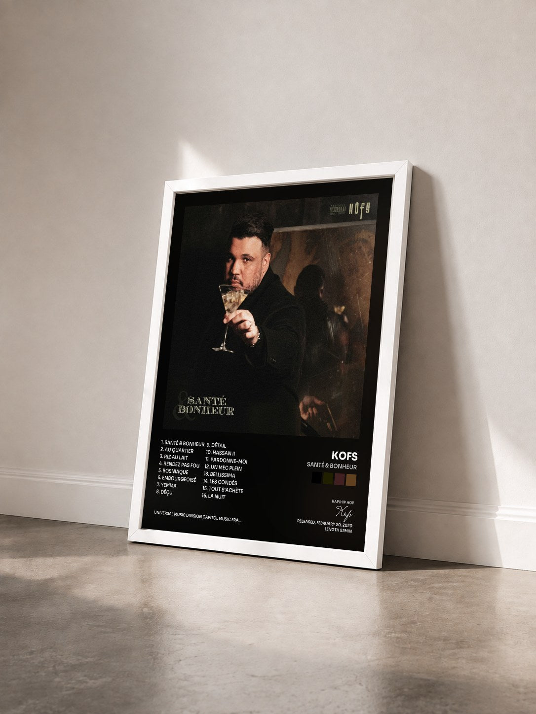 #blanc Tableau de l'album Santé & Bonheur de Kofs vu de trois quarts, cadre blanc