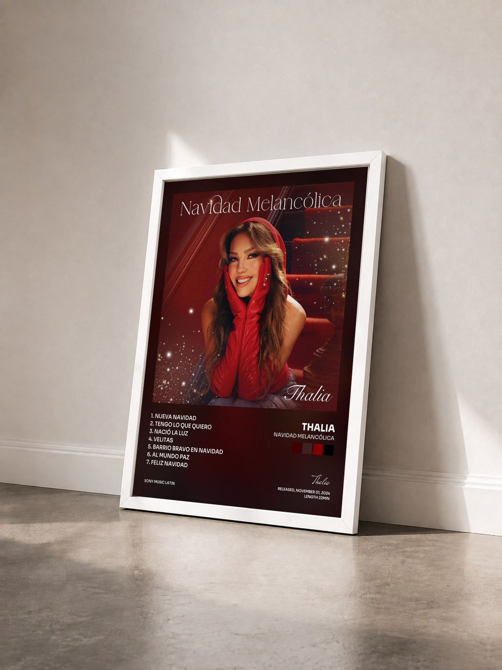 #blanc Tableau de l'album Navidad Melancólica de Thalia vu de trois quarts, cadre blanc