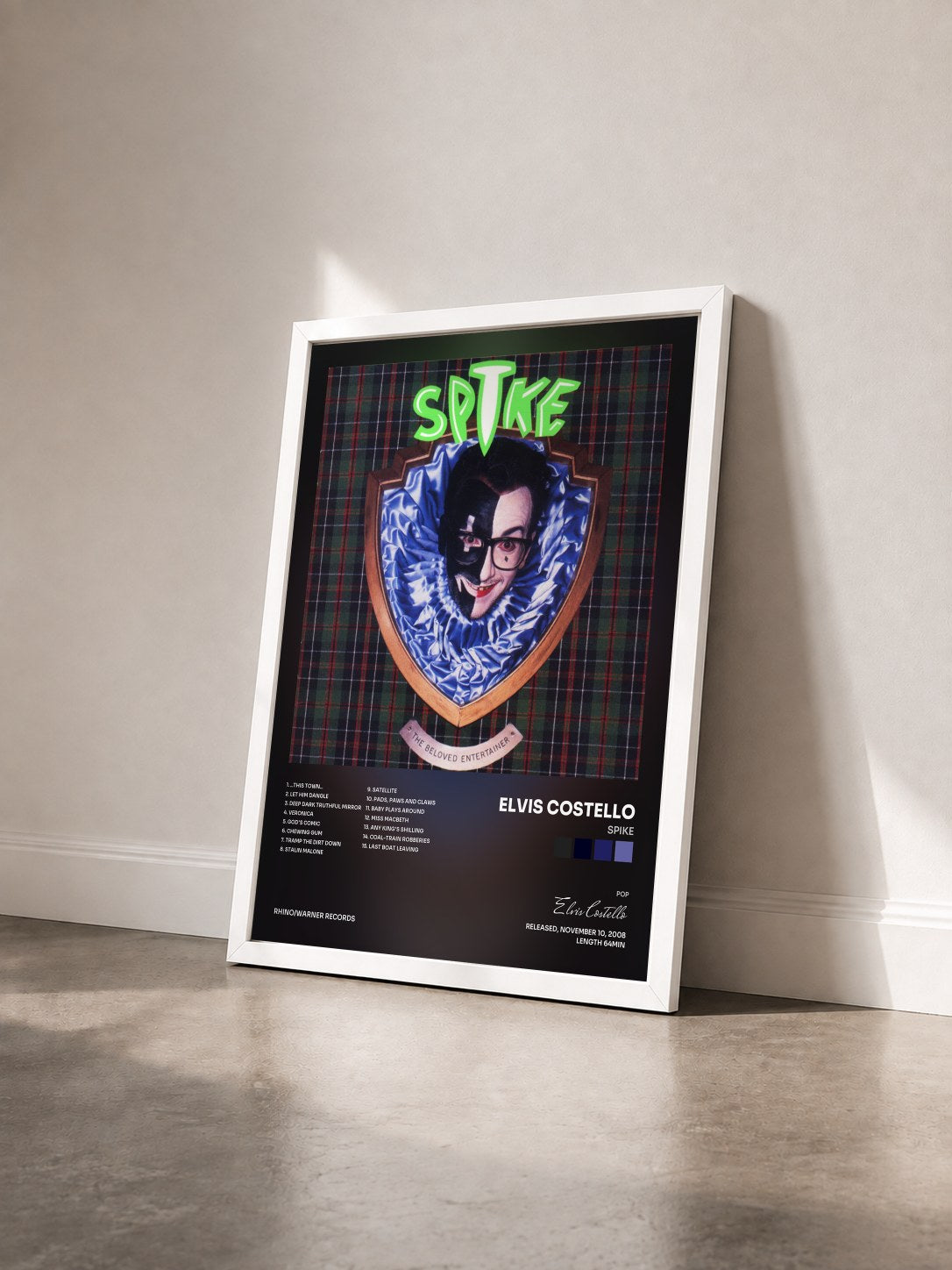 #blanc Tableau de l'album Spike de Elvis Costello vu de trois quarts, cadre blanc
