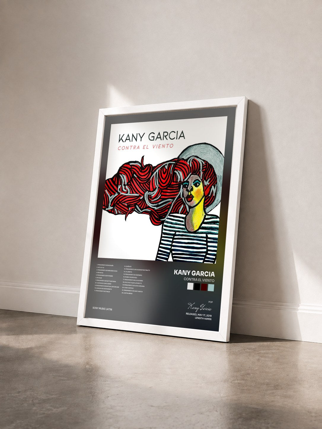 #blanc Tableau de l'album Contra el Viento de Kany Garcia vu de trois quarts, cadre blanc