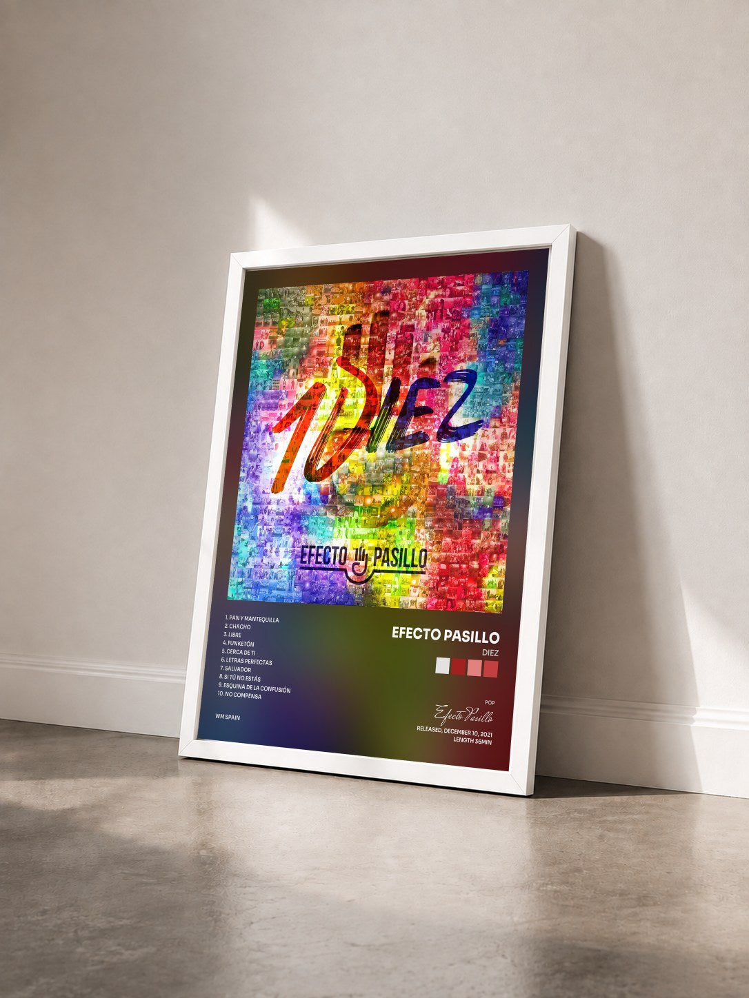 #blanc Tableau de l'album DIEZ de Efecto Pasillo vu de trois quarts, cadre blanc